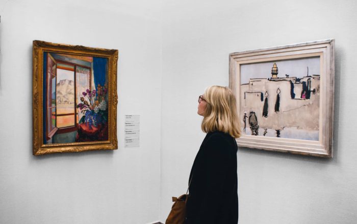 woman staring at art