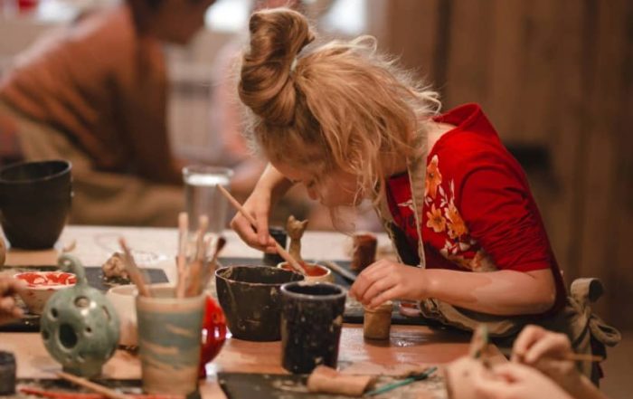 Young girl at art education workshop