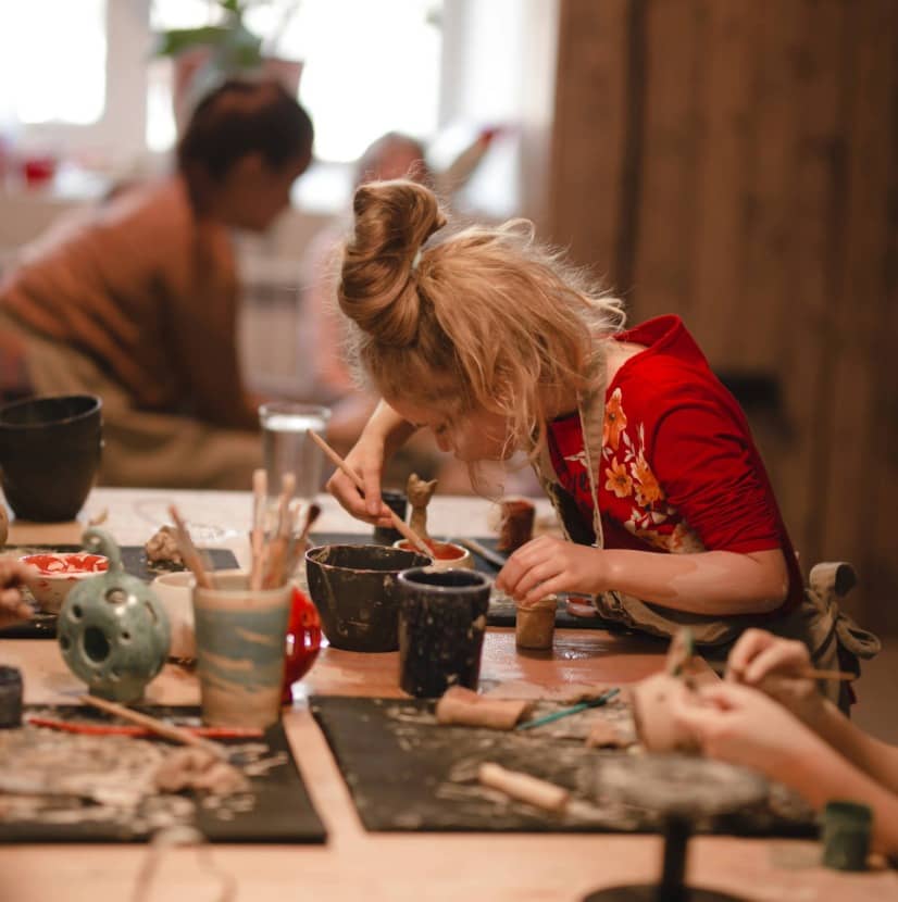 Young girl at art education workshop